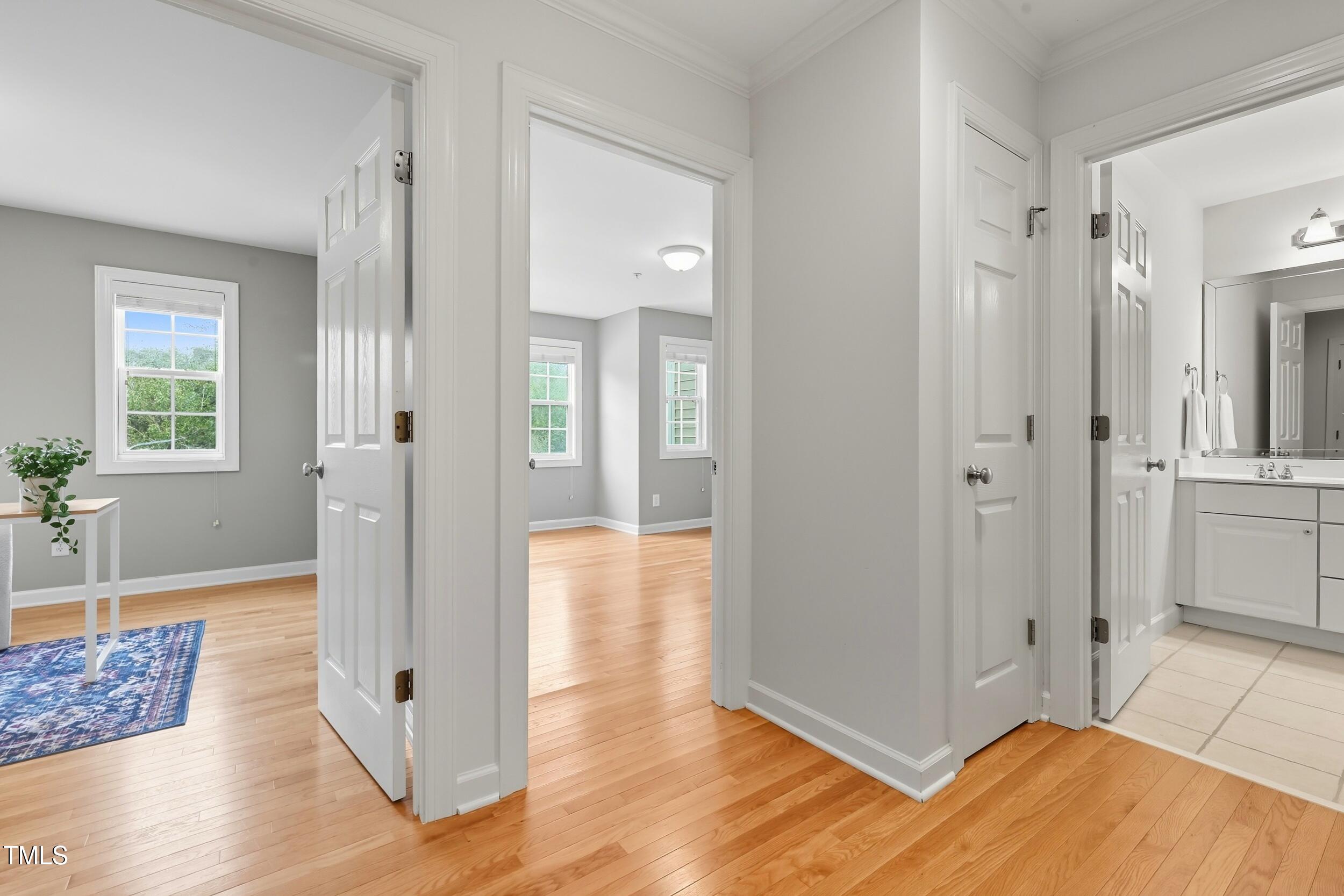 222 Towne Ridge Lane Chapel Hill, NC 27516 - Photo 25 of 39 a view of a livingroom with wooden floor and a bathroom