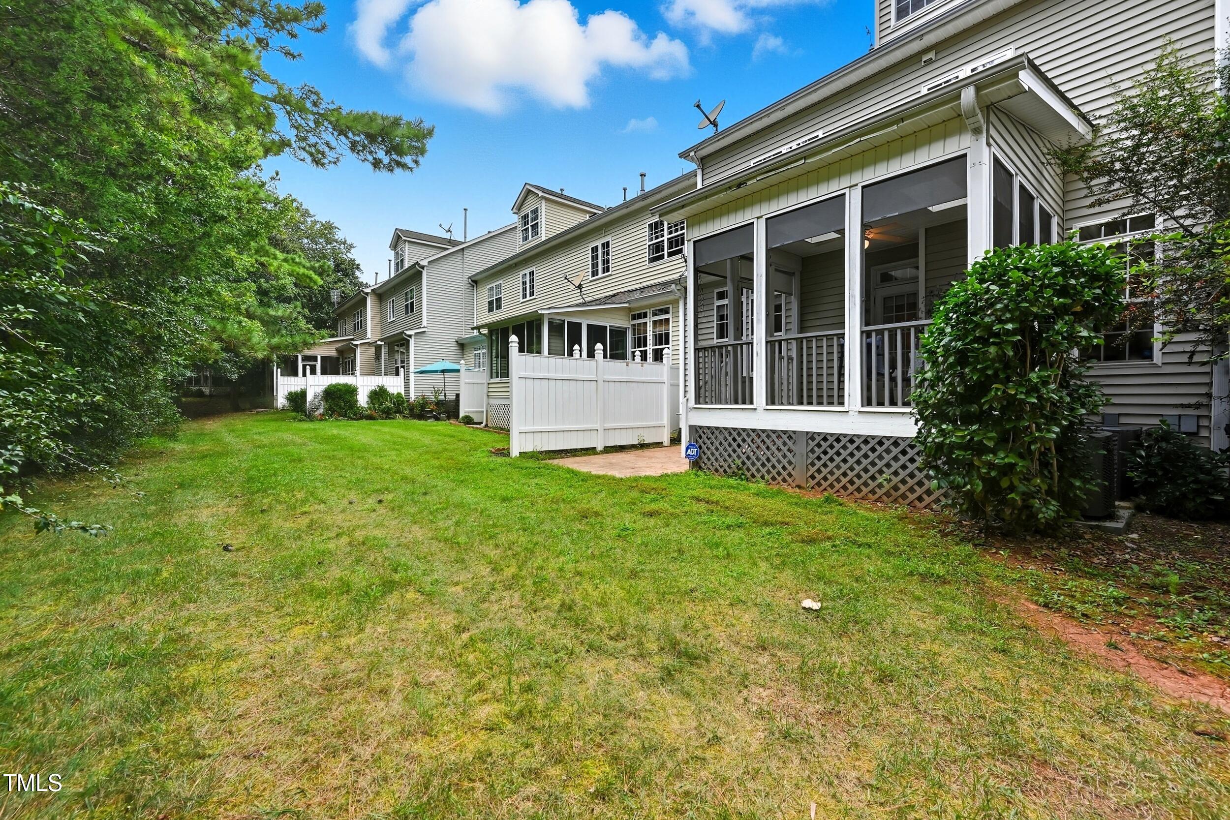 222 Towne Ridge Lane Chapel Hill, NC 27516 - Photo 39 of 39 a view of a house with a big yard and large trees