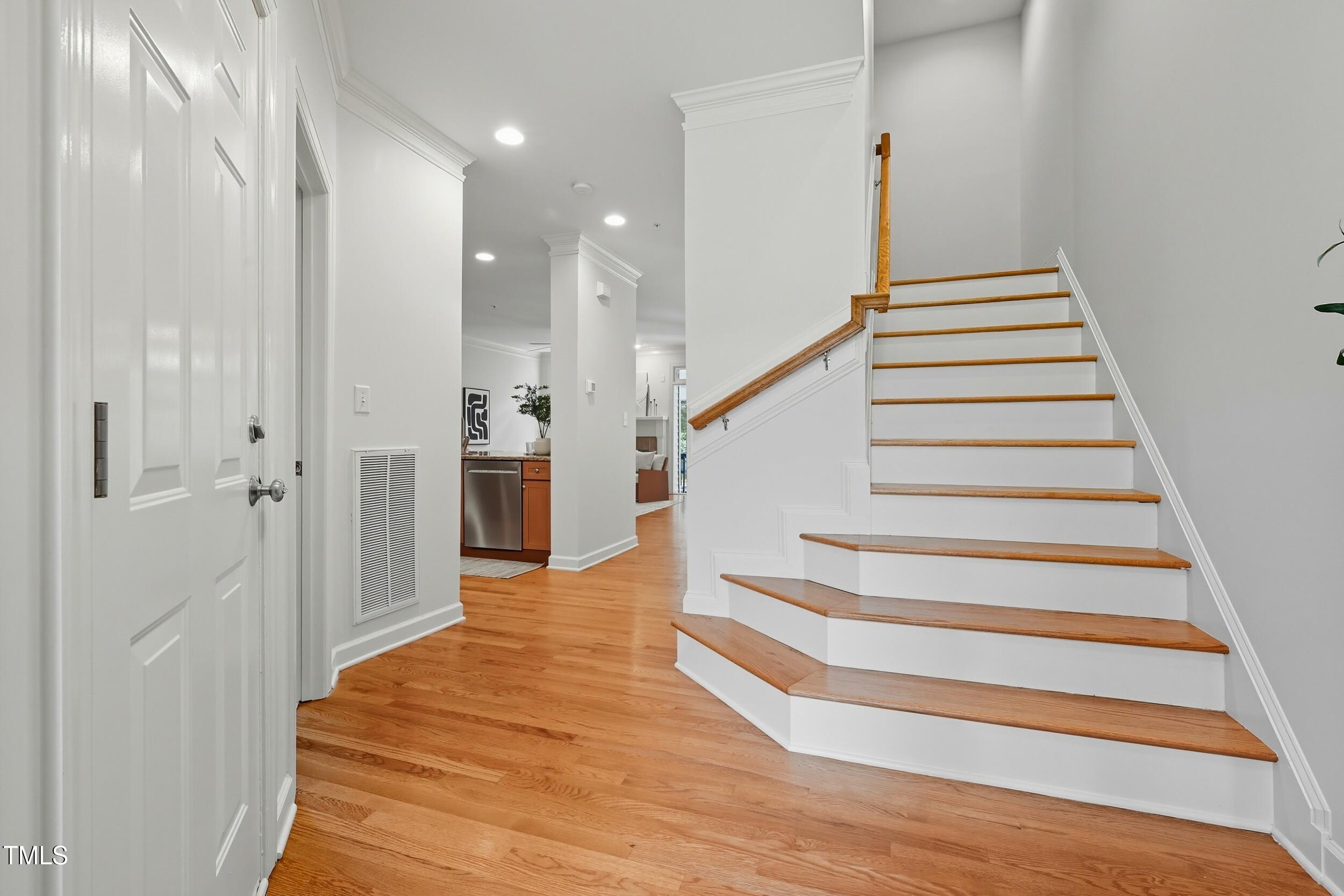222 Towne Ridge Lane Chapel Hill, NC 27516 - Photo 6 of 39 a view of entryway and hall with wooden floor
