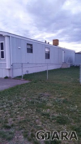 424 32 Road, Unit 294 Clifton, CO 81520 - Photo 5 of 9 a view of a backyard