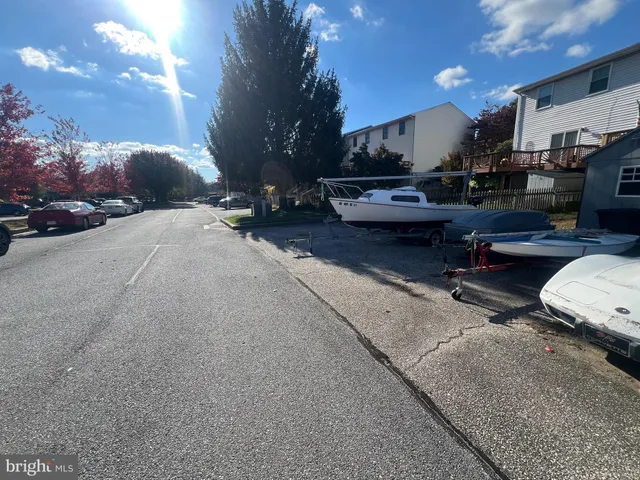 a view of a street with cars