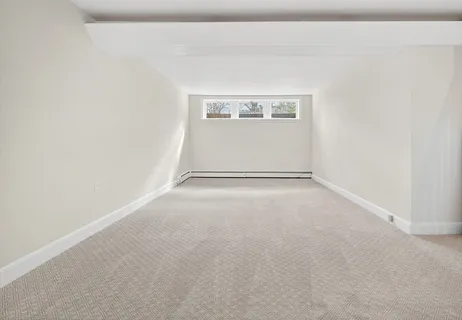 a view of a room with an empty space