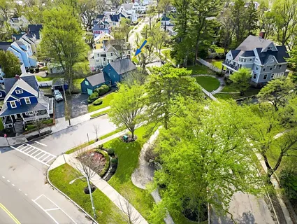 a view of swimming pool with sitting area