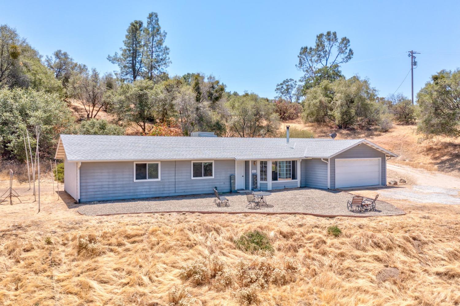 43142 Ellen Mine Road Coarsegold, CA 93614 - Photo 1 of 29 a view of house with a yard covered in snow