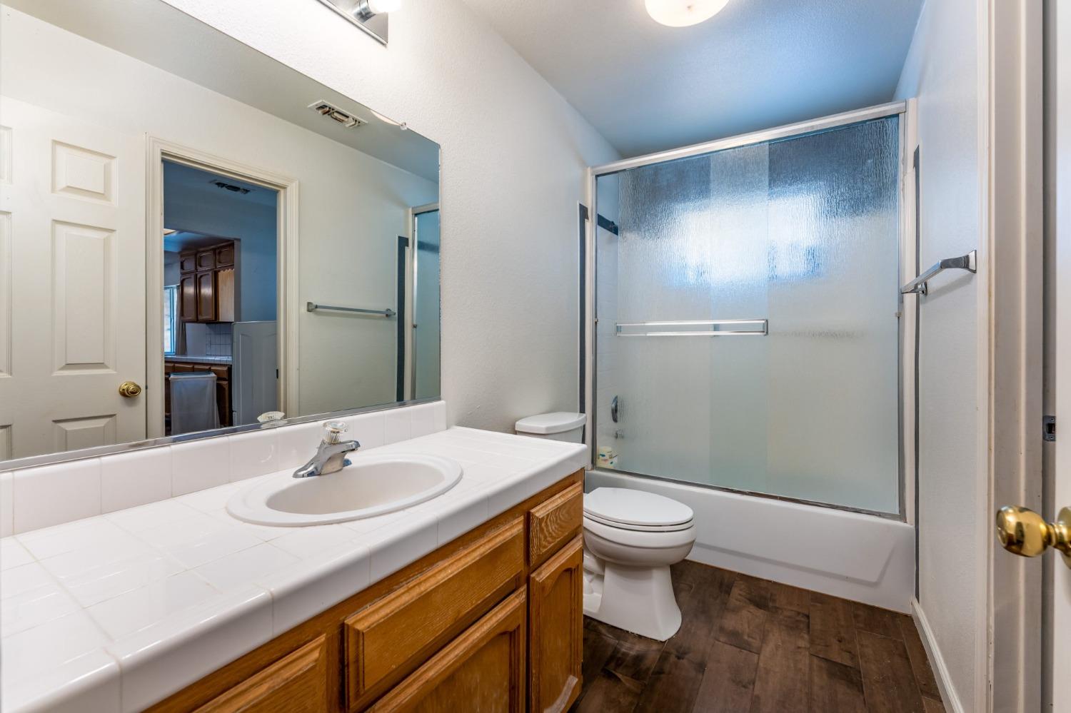 43142 Ellen Mine Road Coarsegold, CA 93614 - Photo 18 of 29 a bathroom with a sink and a mirror