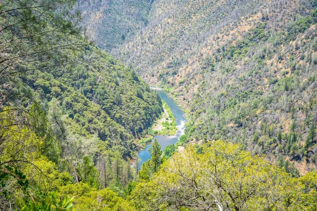 a view of mountain view with mountains in the background