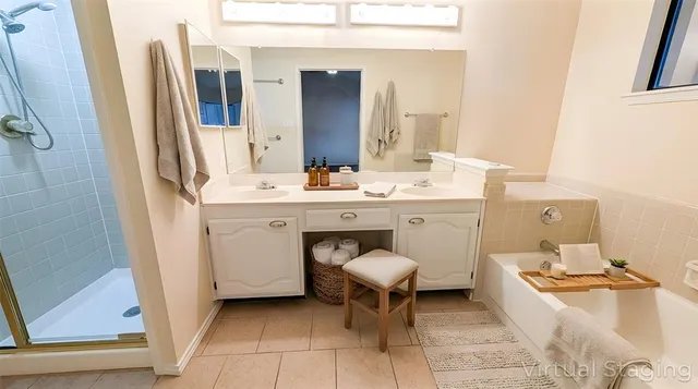 a bathroom with a sink toilet and mirror