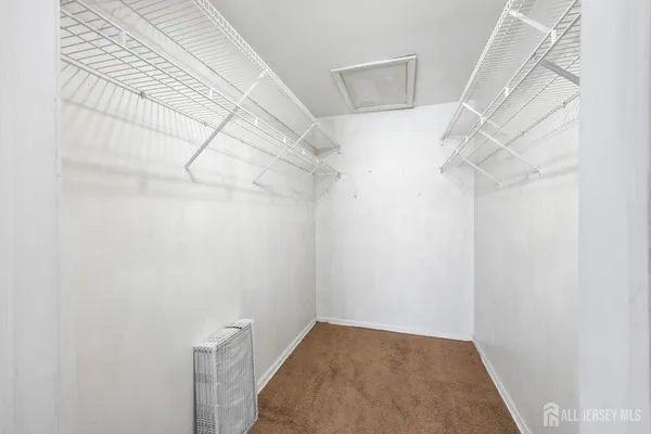 a view of a room with racks on the wall