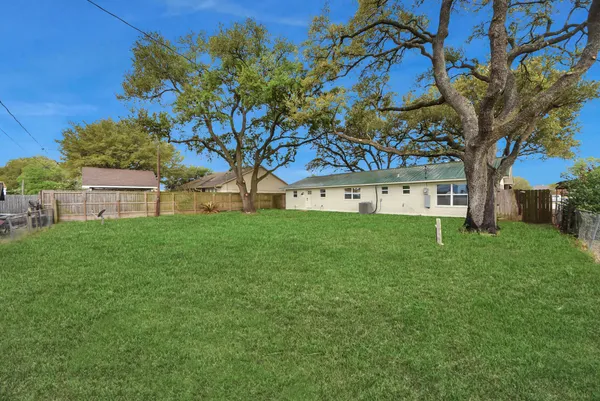 a view of a house with a big yard