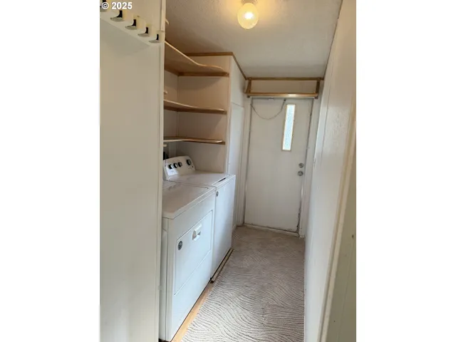 a bathroom with a double vanity sink and mirror