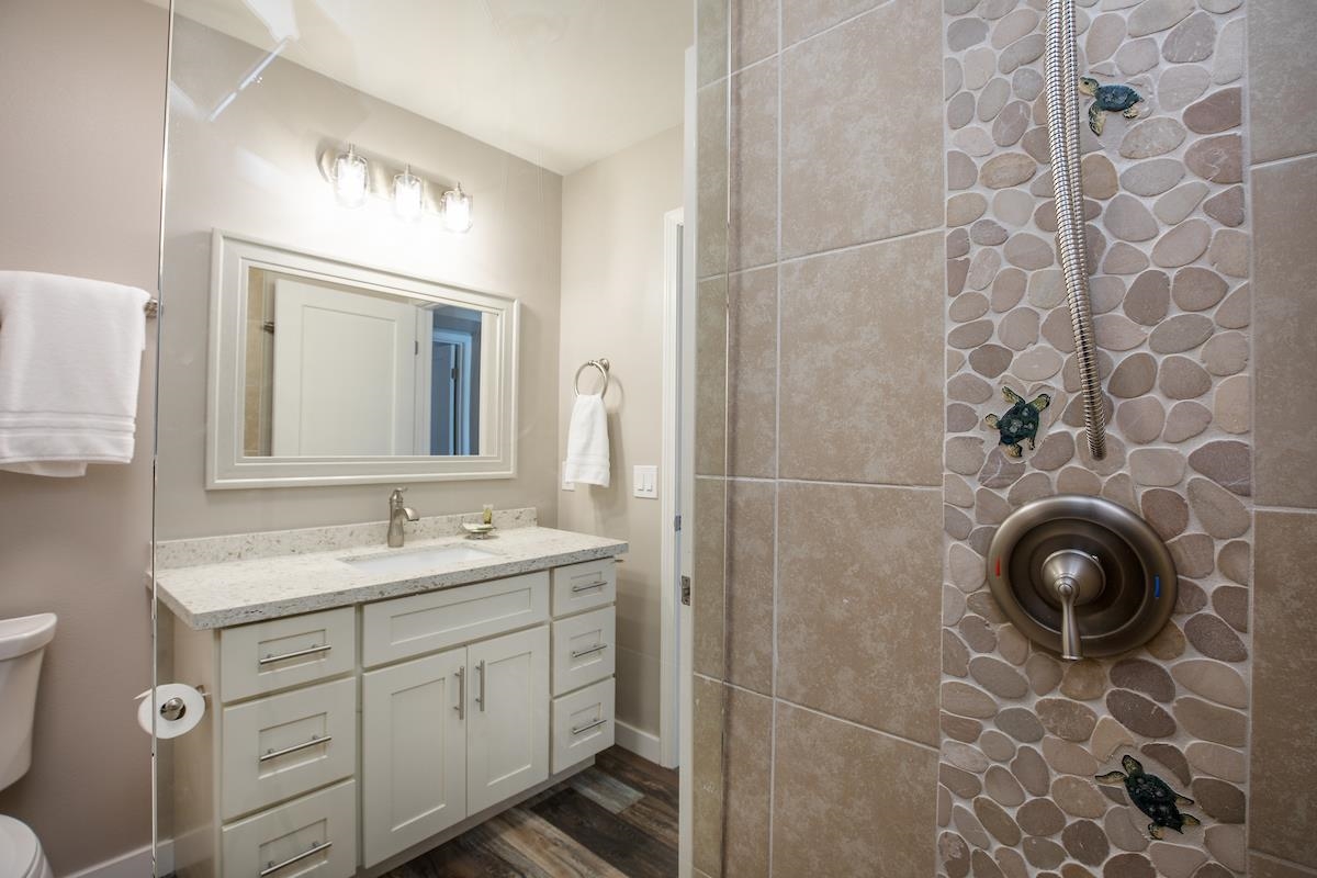 2737 South Kihei Road, Unit 126 Kihei, HI 96753 - Photo 15 of 25 a spacious bathroom with a granite countertop sink a mirror and shower