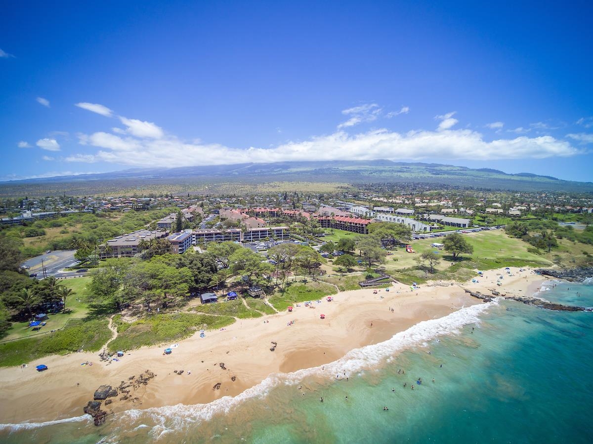 2737 South Kihei Road, Unit 126 Kihei, HI 96753 - Photo 2 of 25 a view of a lake with beach and city
