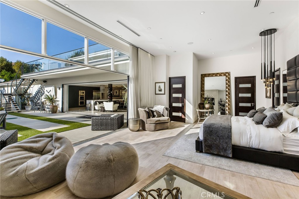 207 Saddlebow Road Bell Canyon, CA 91307 - Photo 11 of 33 a bedroom with furniture and a large window