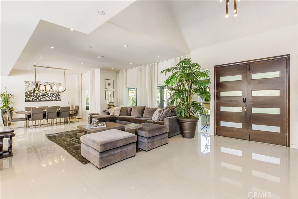 207 Saddlebow Road Bell Canyon, CA 91307 - Photo 3 of 33 a living room with furniture and a potted plant