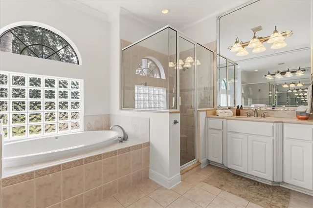 a bedroom with a bed and a furniture