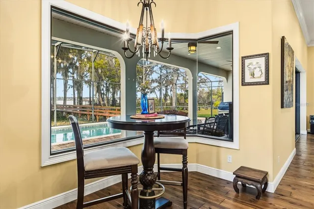 a view of a room with furniture and window