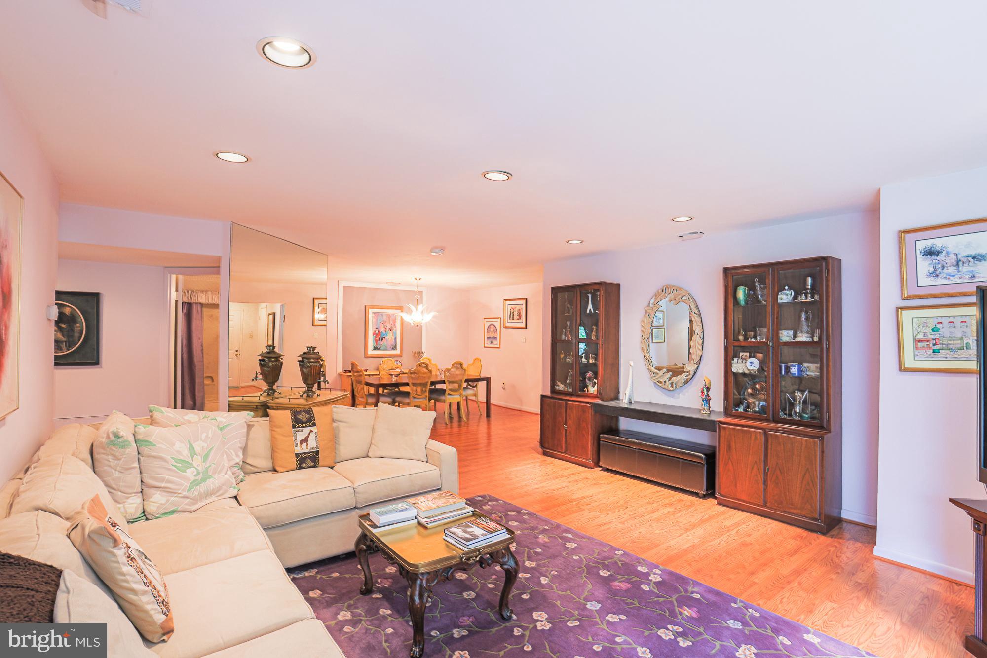 3041 Fallstaff Road, Unit 304D Baltimore, MD 21209 - Photo 18 of 39 a living room with furniture and a large window