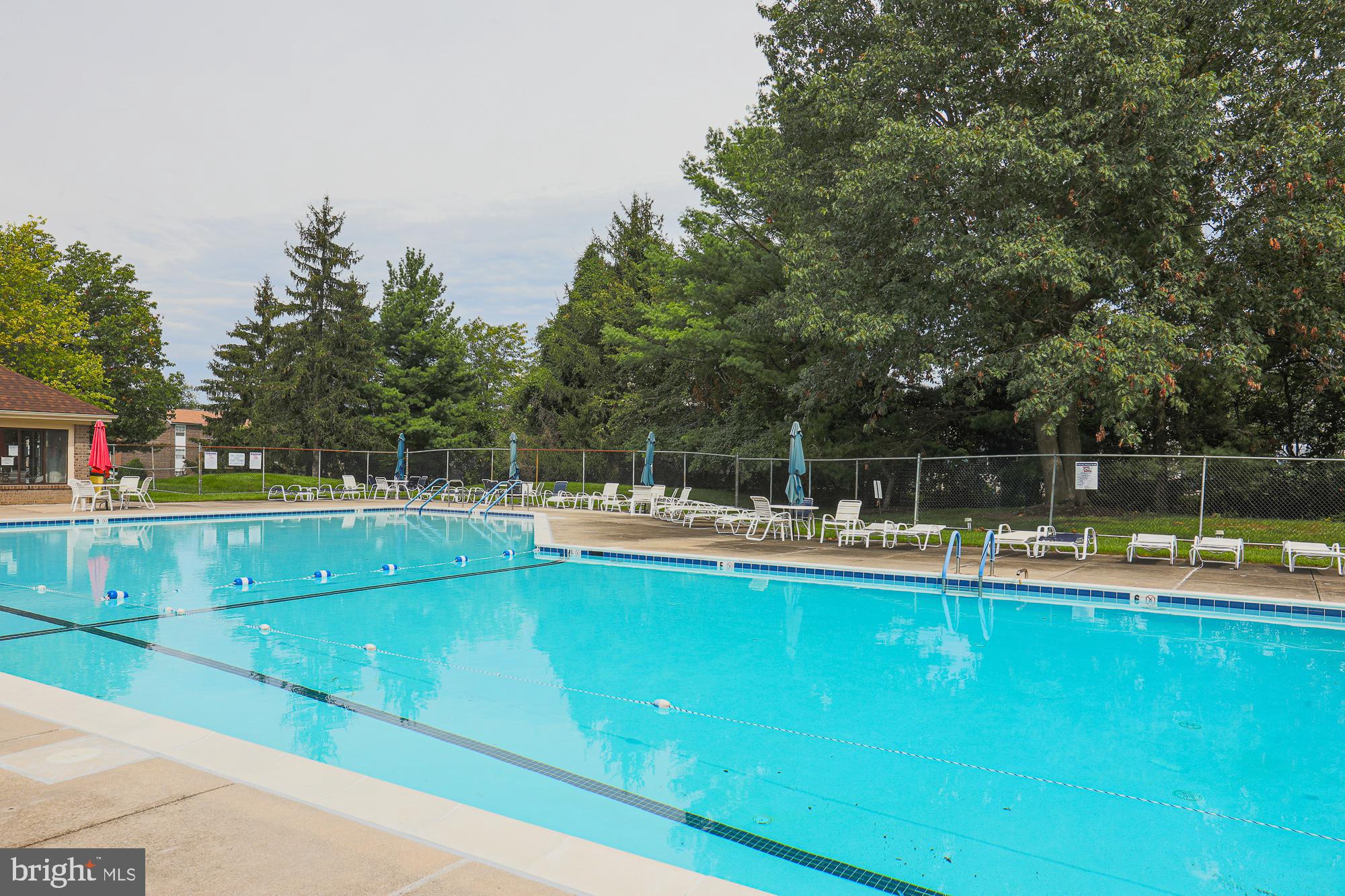 3041 Fallstaff Road, Unit 304D Baltimore, MD 21209 - Photo 38 of 39 a view of a swimming pool with a yard