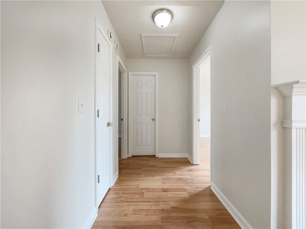 17 Cedars Glen Place Villa Rica, GA 30180 - Photo 14 of 23 a view of a hallway with wooden floor