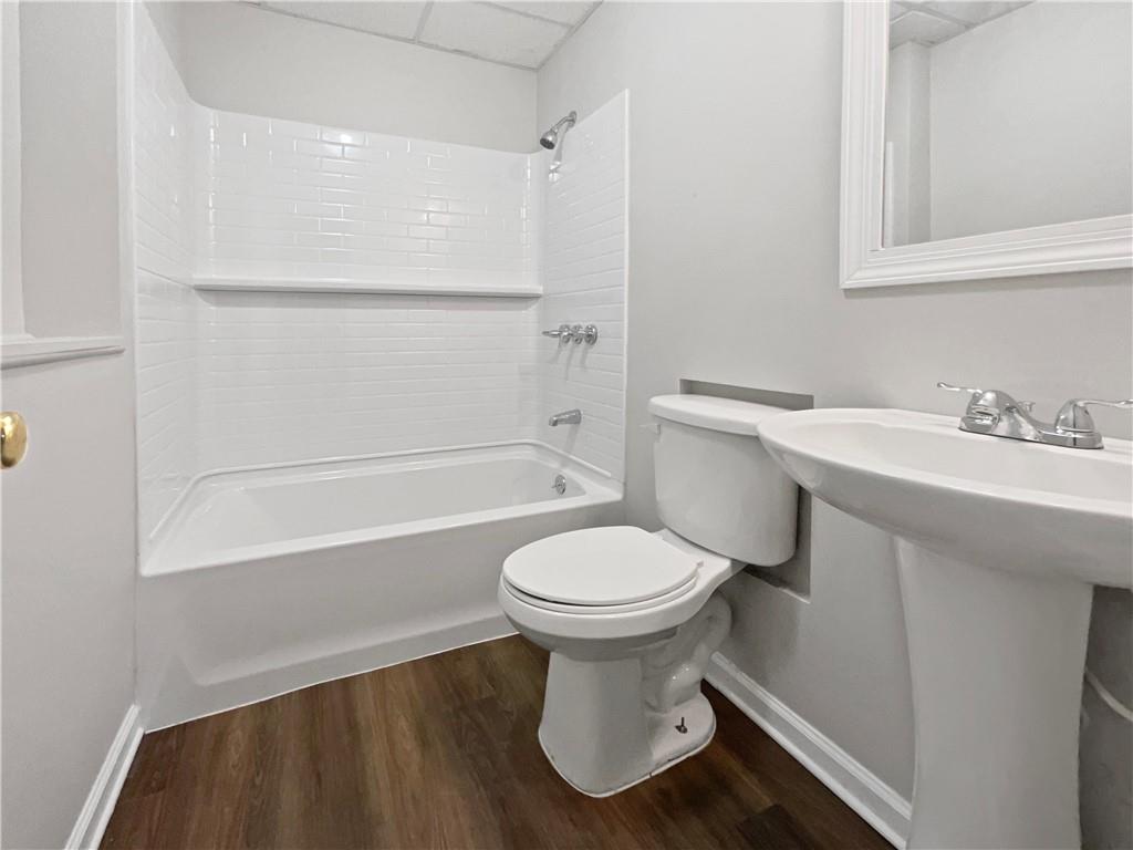 17 Cedars Glen Place Villa Rica, GA 30180 - Photo 16 of 23 a bathroom with a sink toilet and shower
