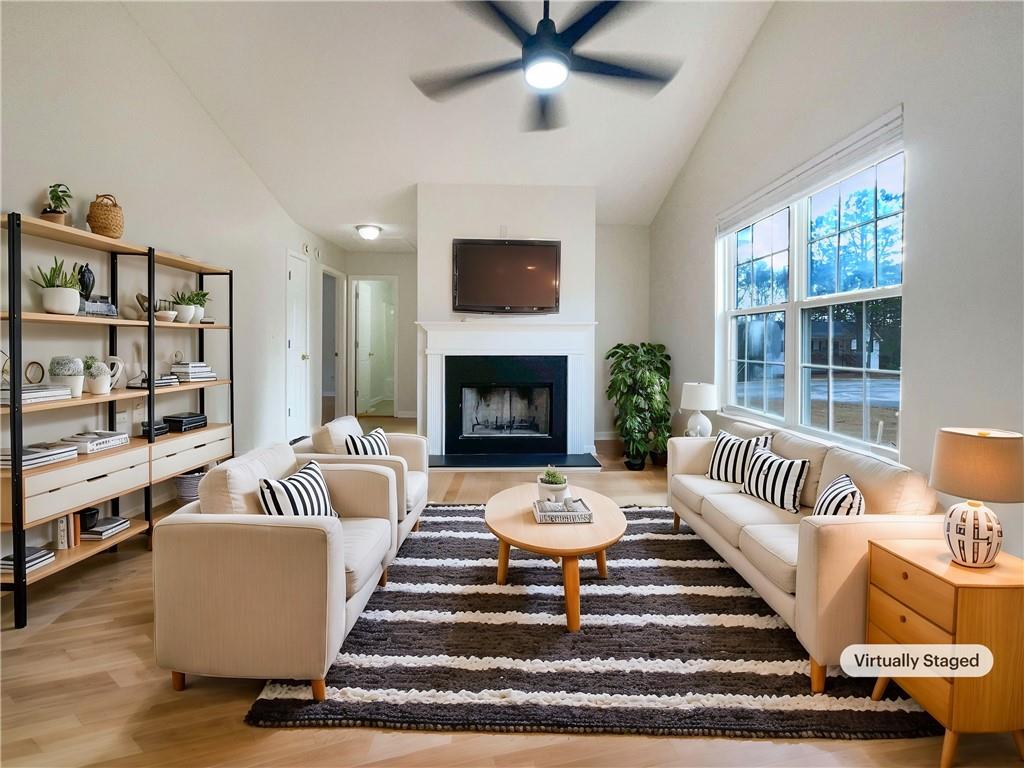17 Cedars Glen Place Villa Rica, GA 30180 - Photo 3 of 23 a living room with furniture and a fireplace