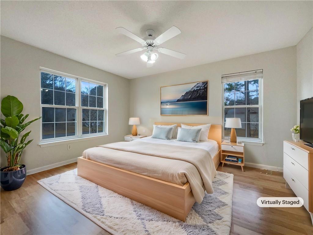 17 Cedars Glen Place Villa Rica, GA 30180 - Photo 9 of 23 a spacious bedroom with a large bed and a window