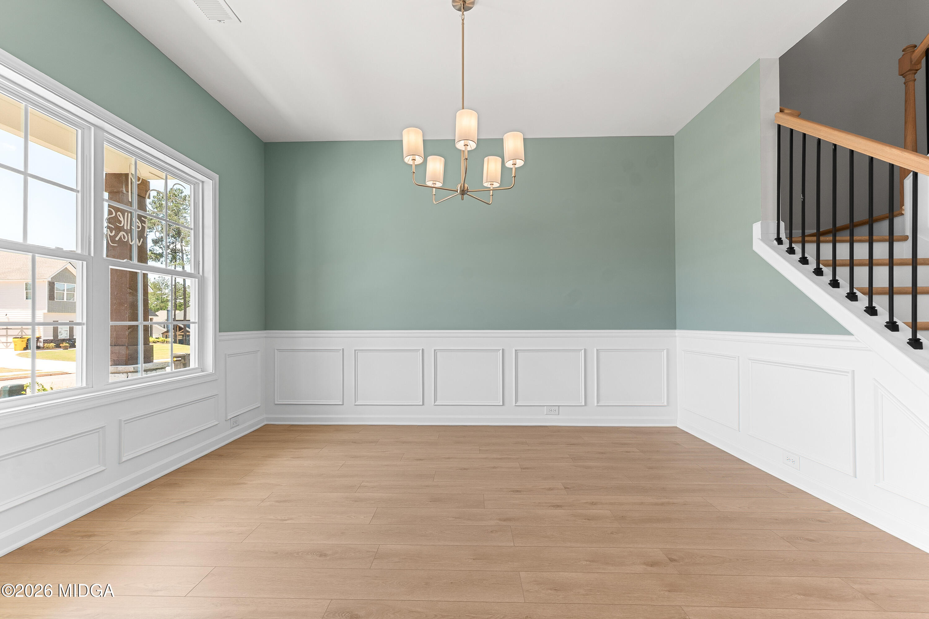 5393 Felles Way, Unit 359 Forsyth, GA 31029 - Photo 5 of 54 a view of an empty room with a window