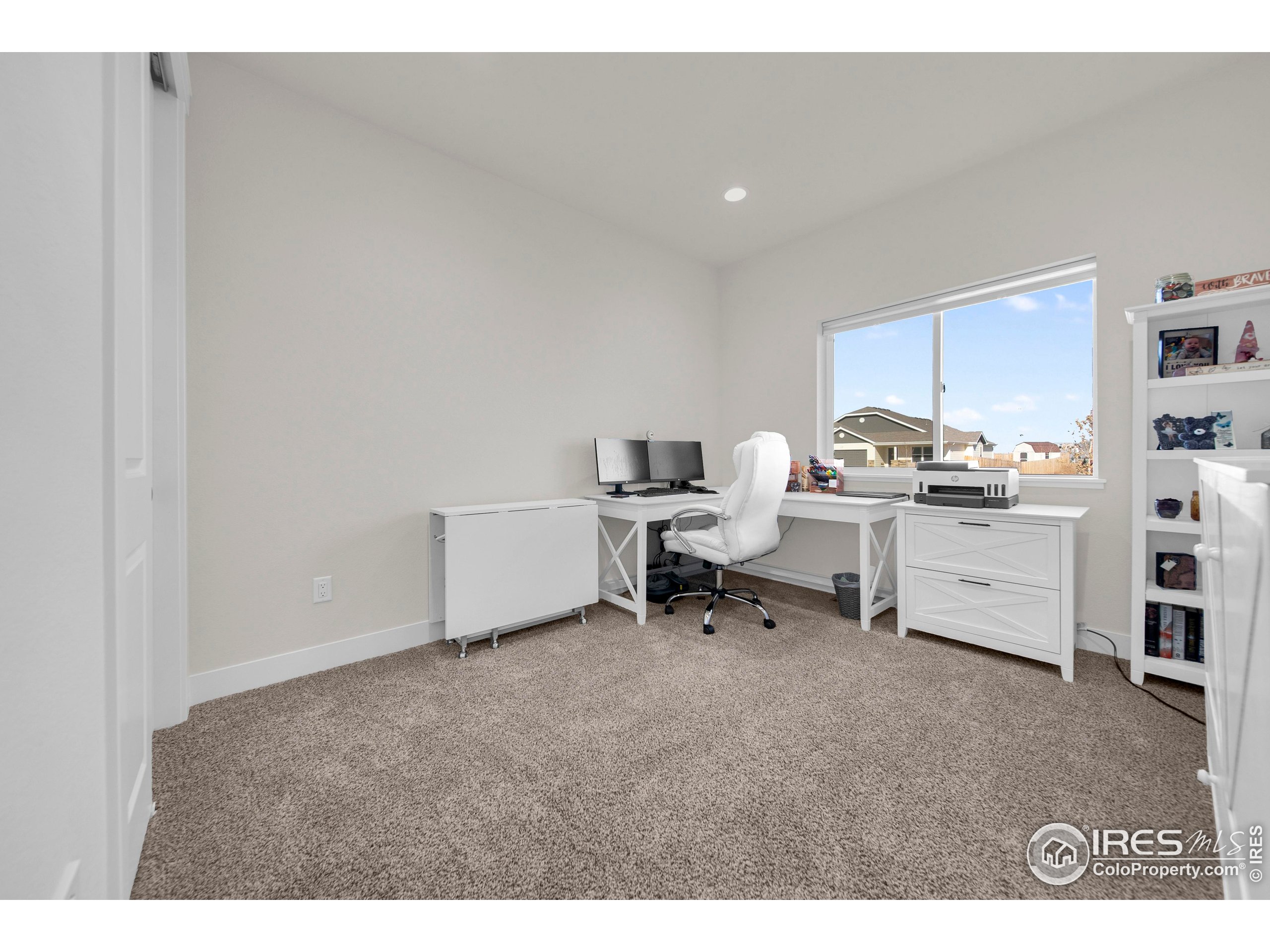 116 7th Avenue Wiggins, CO 80654 - Photo 26 of 42 a view of a workspace with furniture