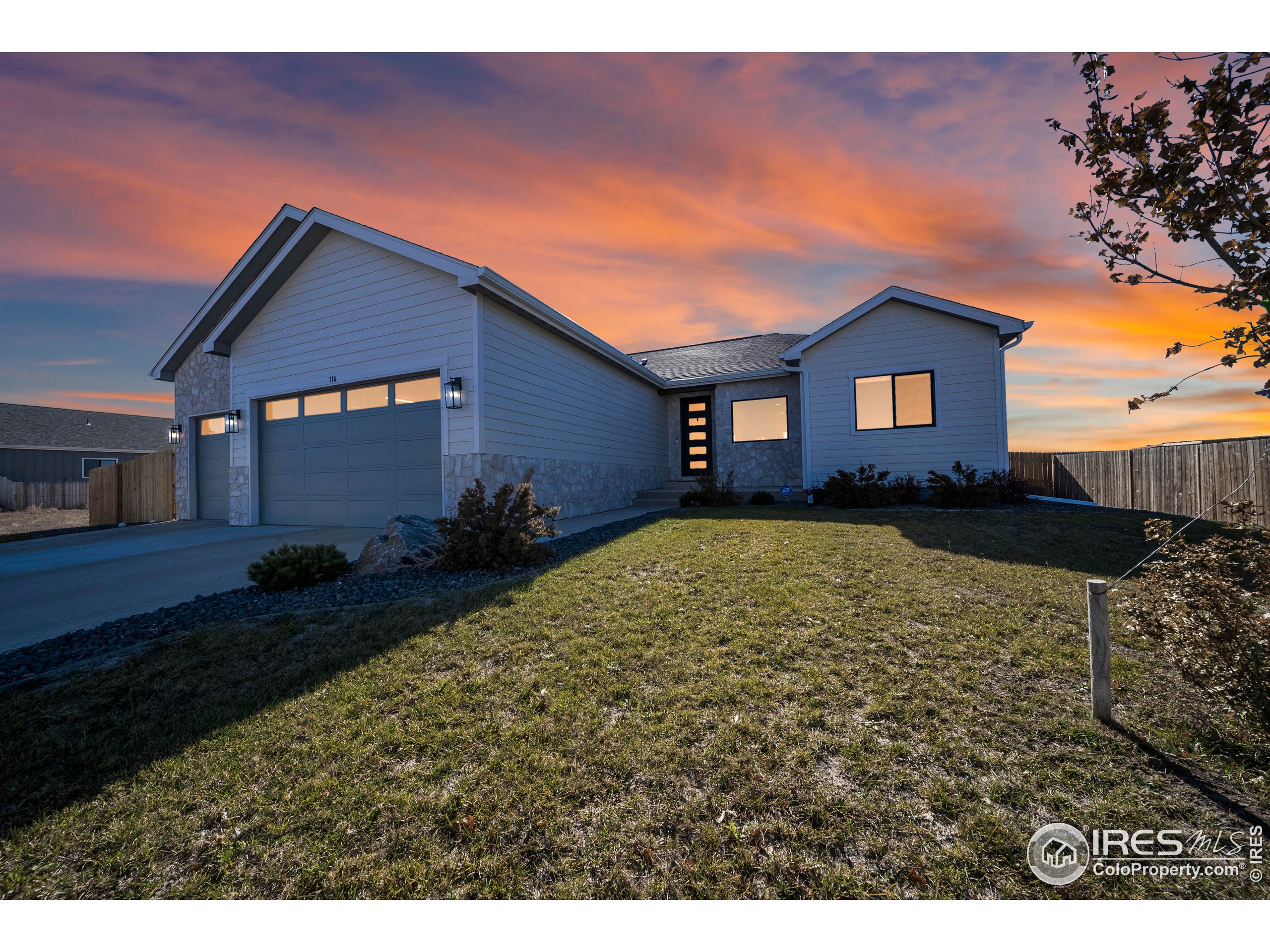 116 7th Avenue Wiggins, CO 80654 - Photo 42 of 42 a house view with a outdoor space