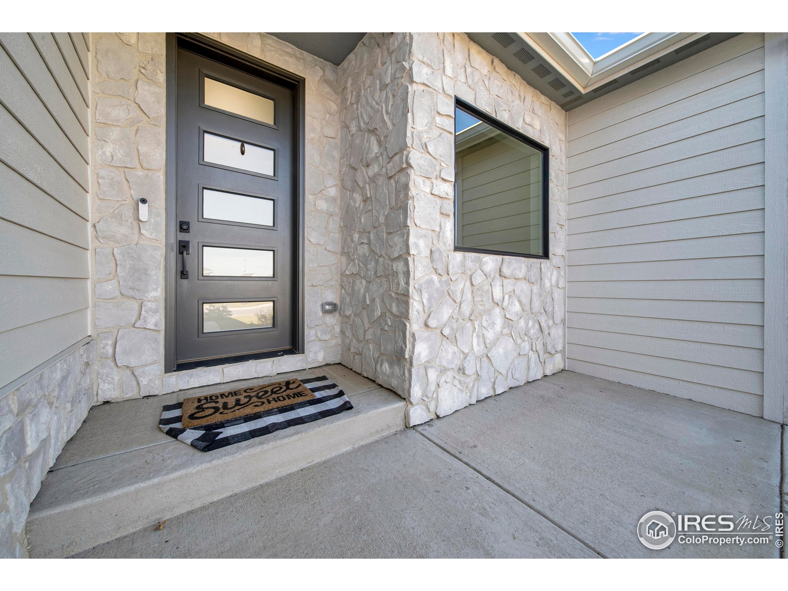 116 7th Avenue Wiggins, CO 80654 - Photo 7 of 42 a view of front door of house