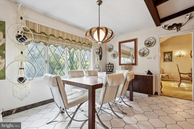 a kitchen with stainless steel appliances granite countertop a refrigerator and a stove