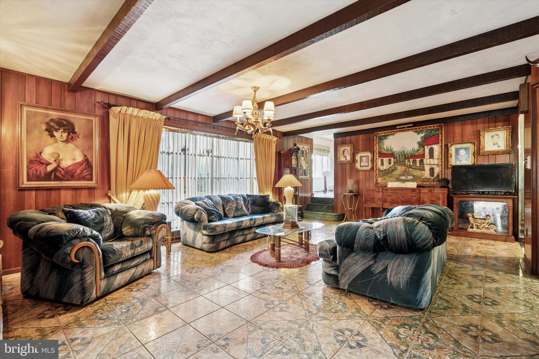 341 Cedar Road Elkins Park, PA 19027 - Photo 15 of 59 a living room with furniture and a large window