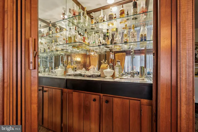 a kitchen with stainless steel appliances granite countertop a sink and a stove