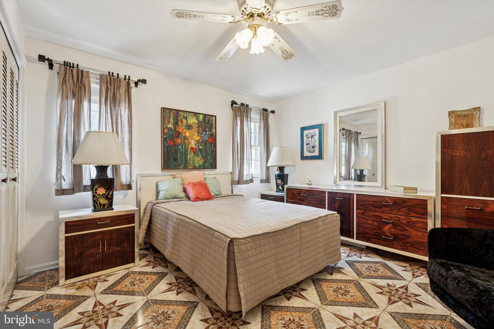 341 Cedar Road Elkins Park, PA 19027 - Photo 30 of 59 a room with a bed and a dresser