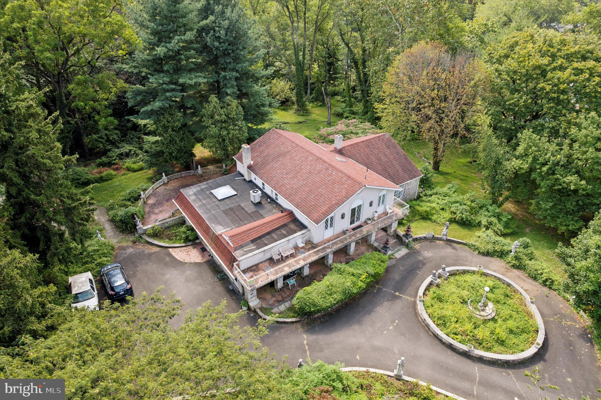341 Cedar Road Elkins Park, PA 19027 - Photo 41 of 59 an aerial view of a house with garden space and a swimming pool