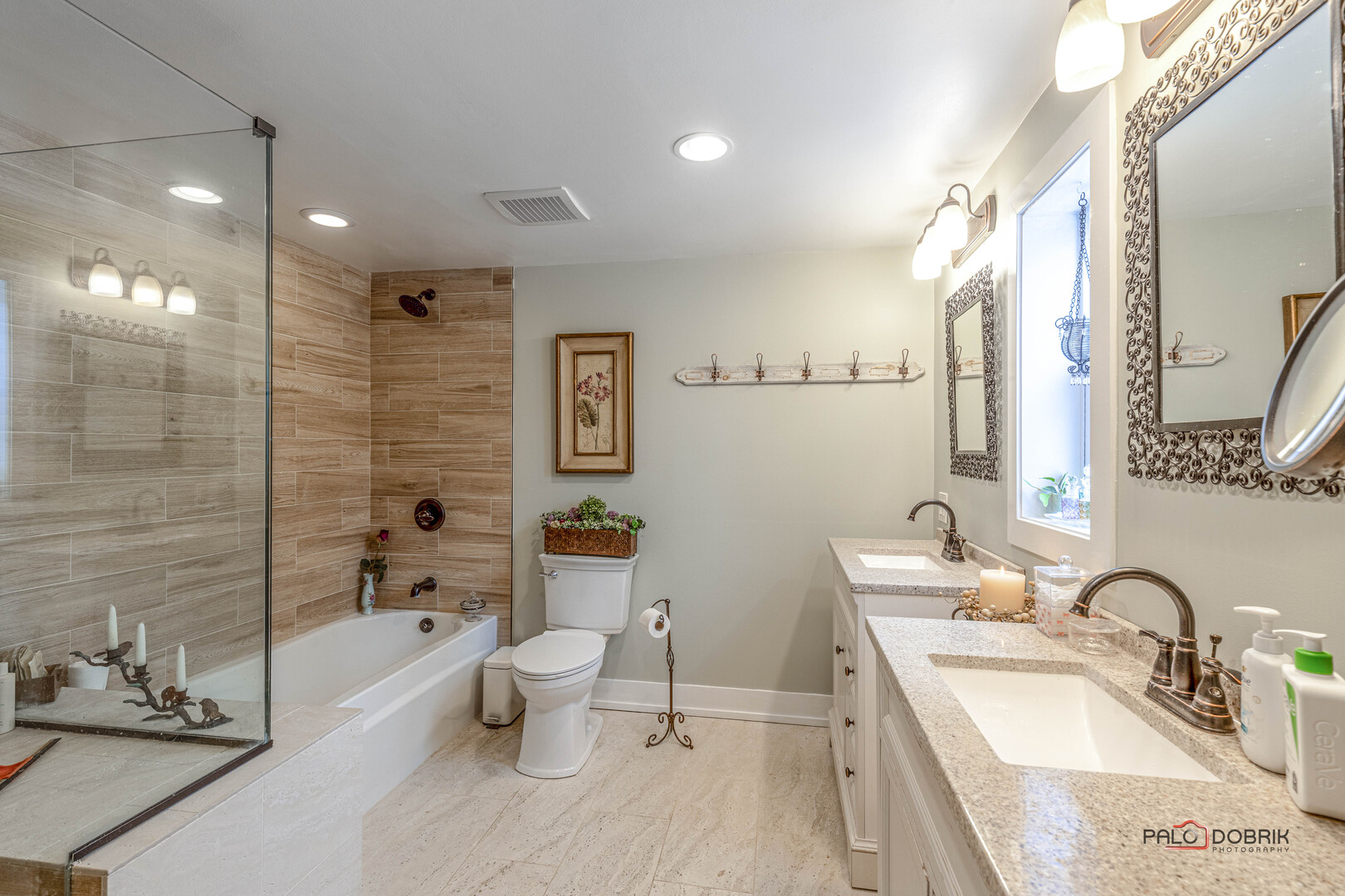 3386 Old McHenry Road Long Grove, IL 60047 - Photo 14 of 48 a bathroom with a granite countertop sink a toilet a mirror and bathtub