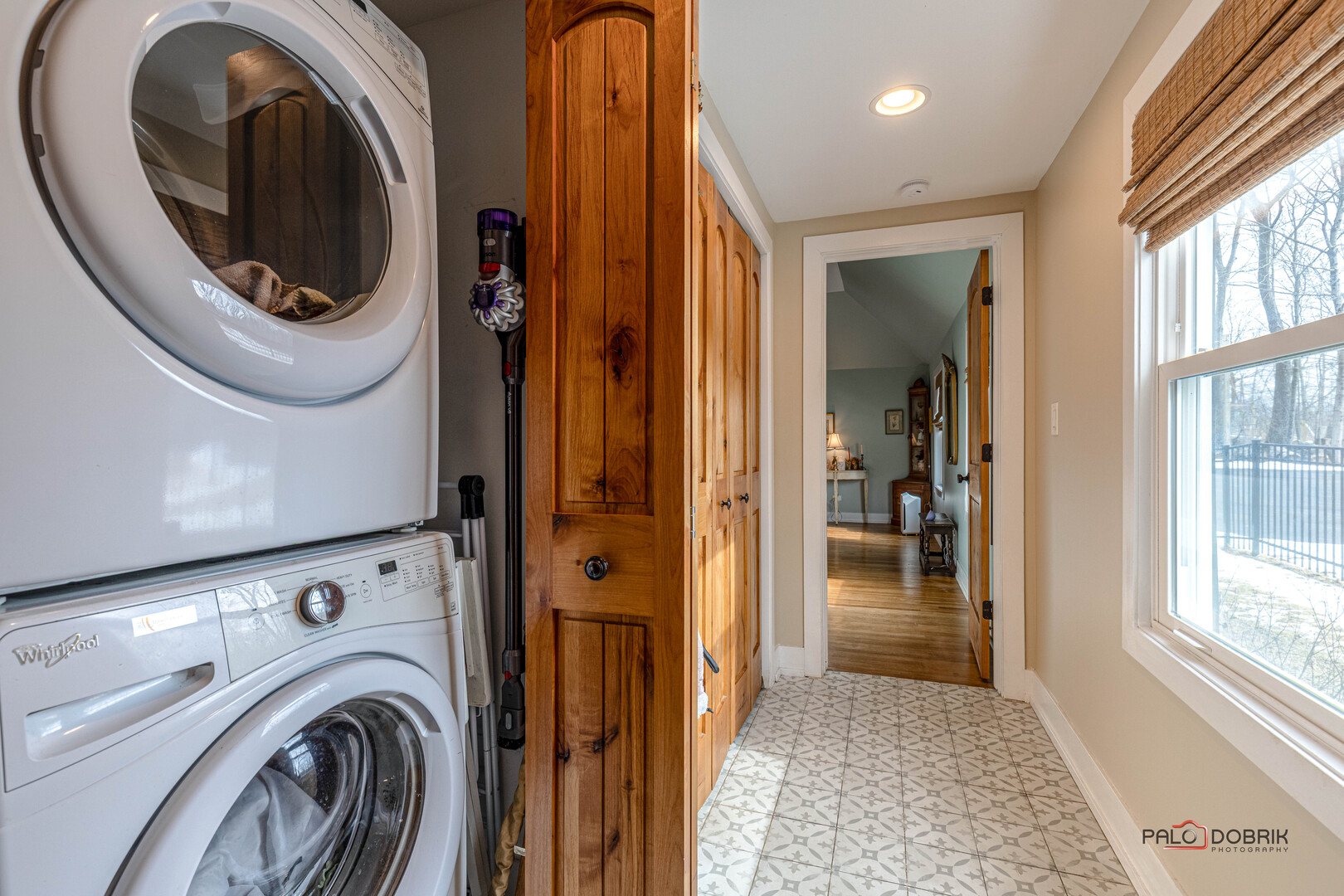 3386 Old McHenry Road Long Grove, IL 60047 - Photo 16 of 48 a view of a hallway with washer and dryer