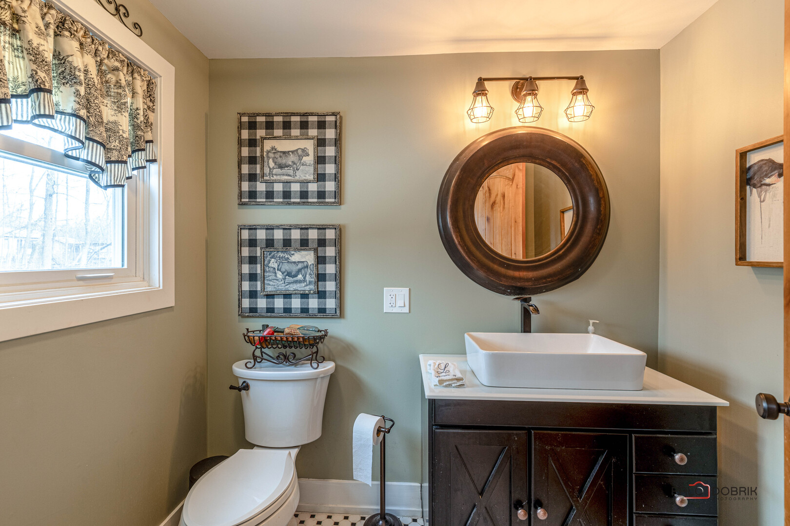 3386 Old McHenry Road Long Grove, IL 60047 - Photo 17 of 48 a bathroom with a toilet a sink and a mirror