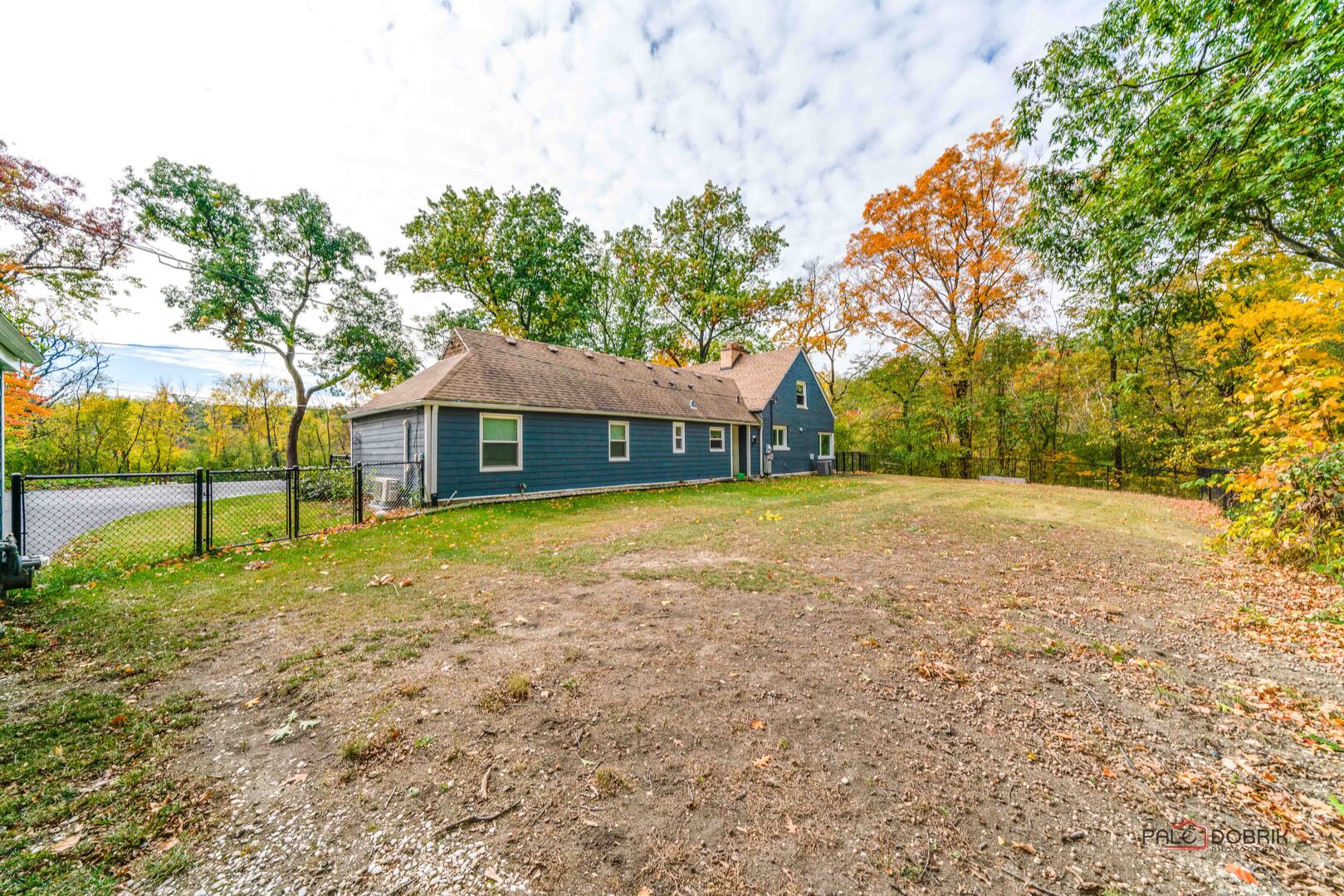3386 Old McHenry Road Long Grove, IL 60047 - Photo 26 of 48 a house with trees in front of it