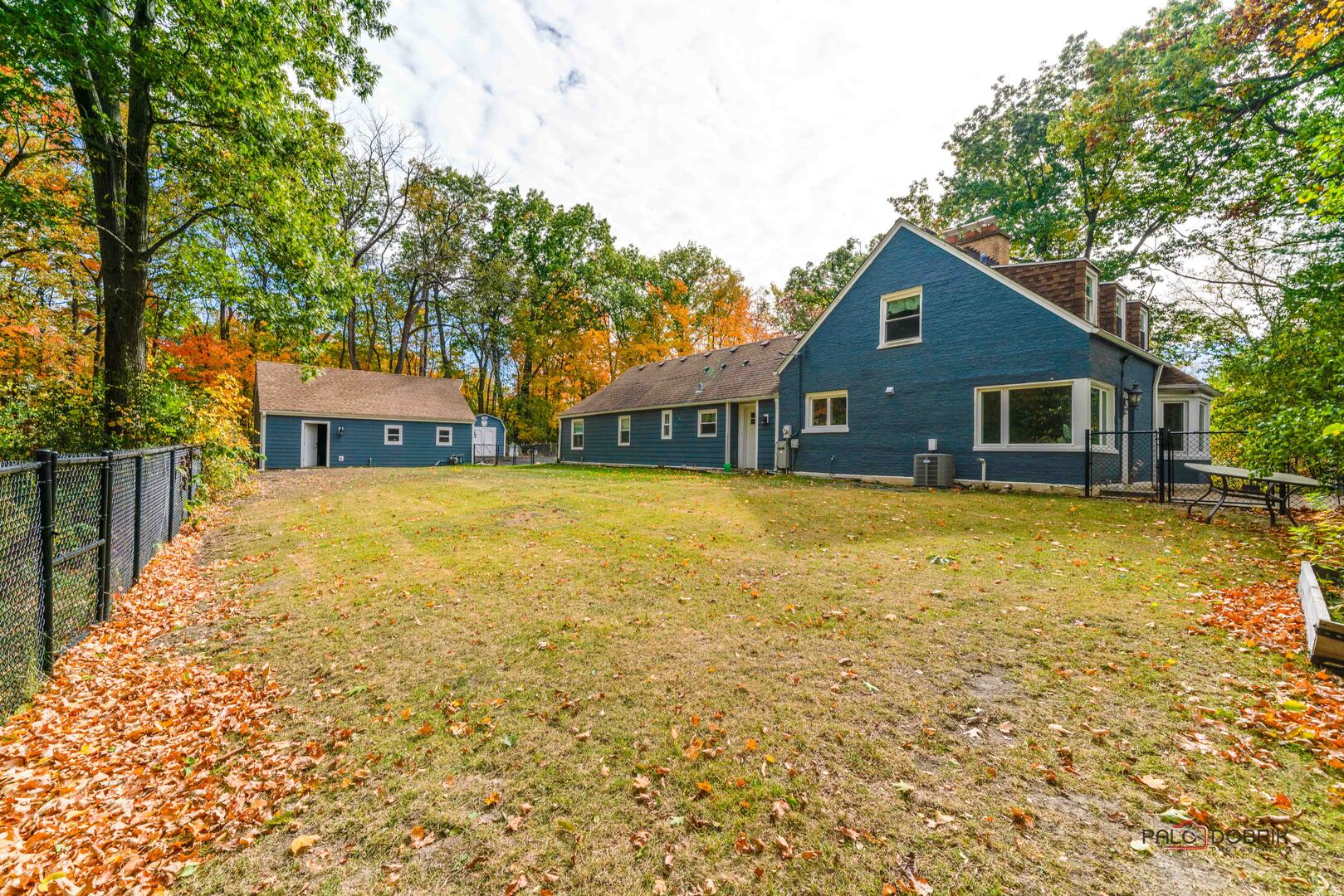 3386 Old McHenry Road Long Grove, IL 60047 - Photo 27 of 48 a view of a house with pool and tree s