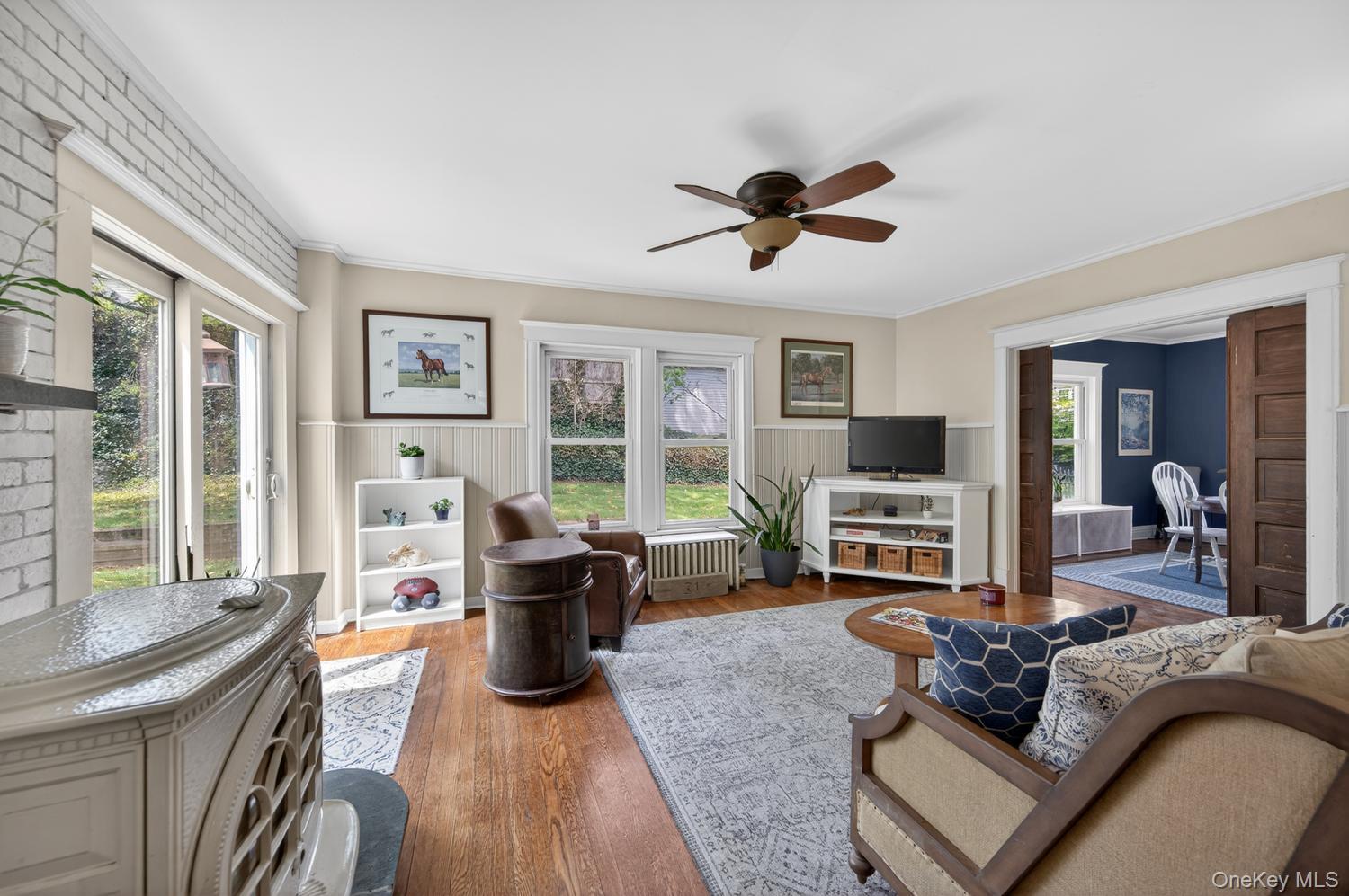 17 Riggs Place Locust Valley, NY 11560 - Photo 11 of 25 Den with sliders to back yard