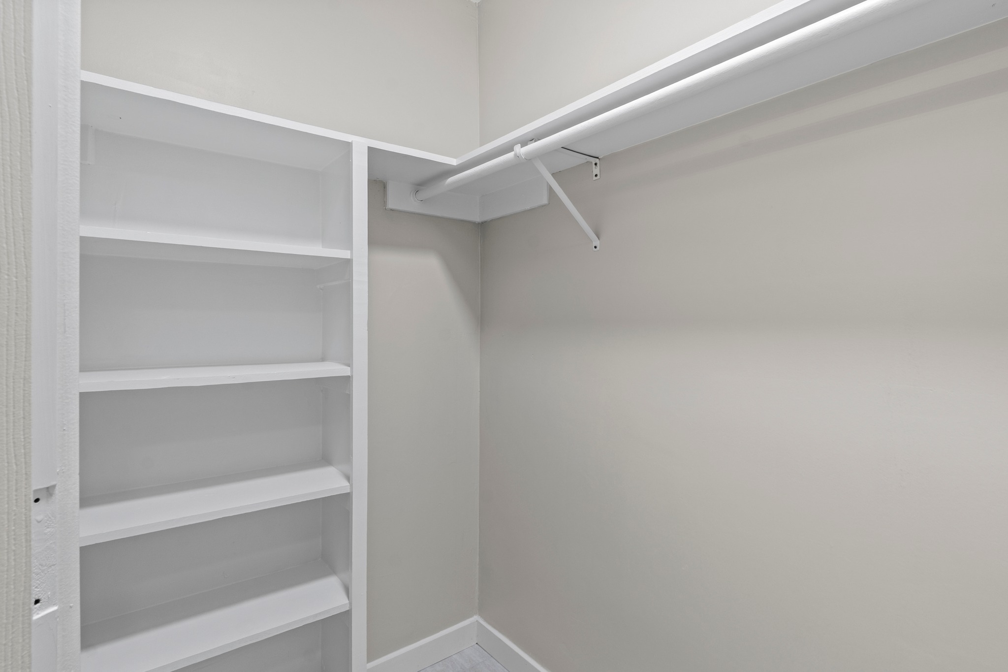 11811 Rotherham Drive Austin, TX 78754 - Photo 23 of 37 Ample shelving and hanging space defines this highly functional, well-organized closet.
