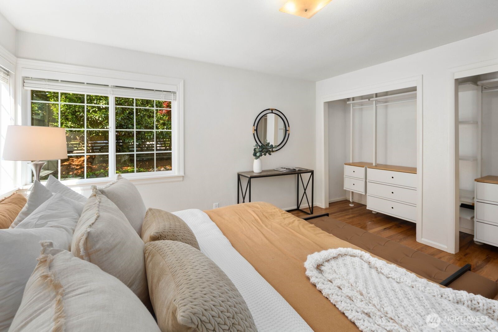 7508 30th Avenue Southwest Seattle, WA 98126 - Photo 16 of 39 a bedroom with a bed and a window