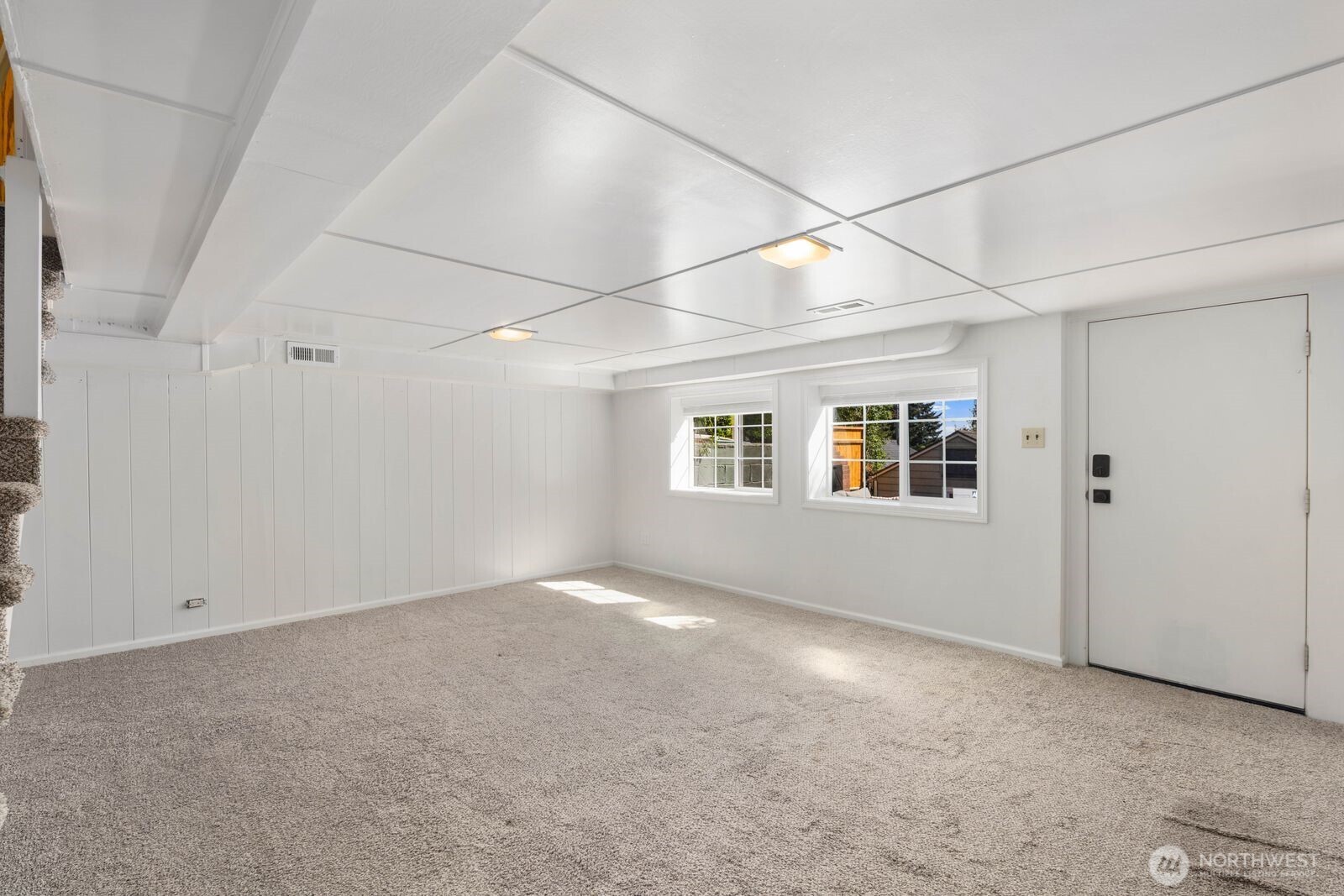 7508 30th Avenue Southwest Seattle, WA 98126 - Photo 24 of 39 an empty room with windows