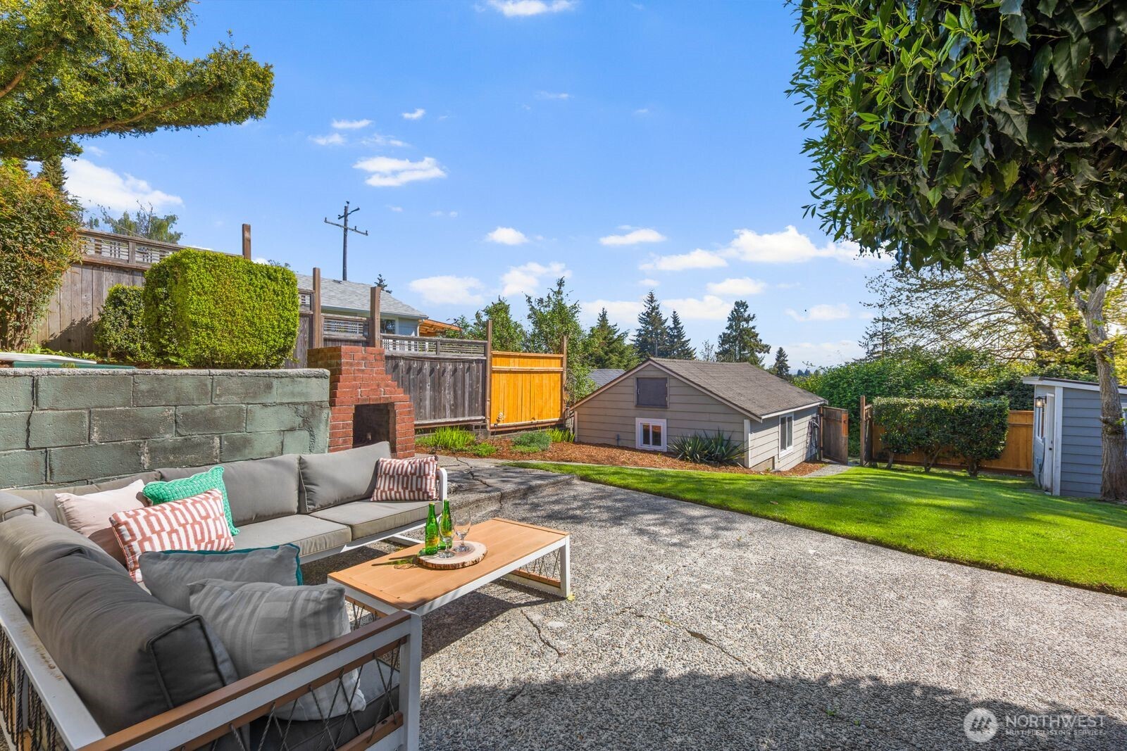 7508 30th Avenue Southwest Seattle, WA 98126 - Photo 29 of 39 a outdoor living space with furniture and city view