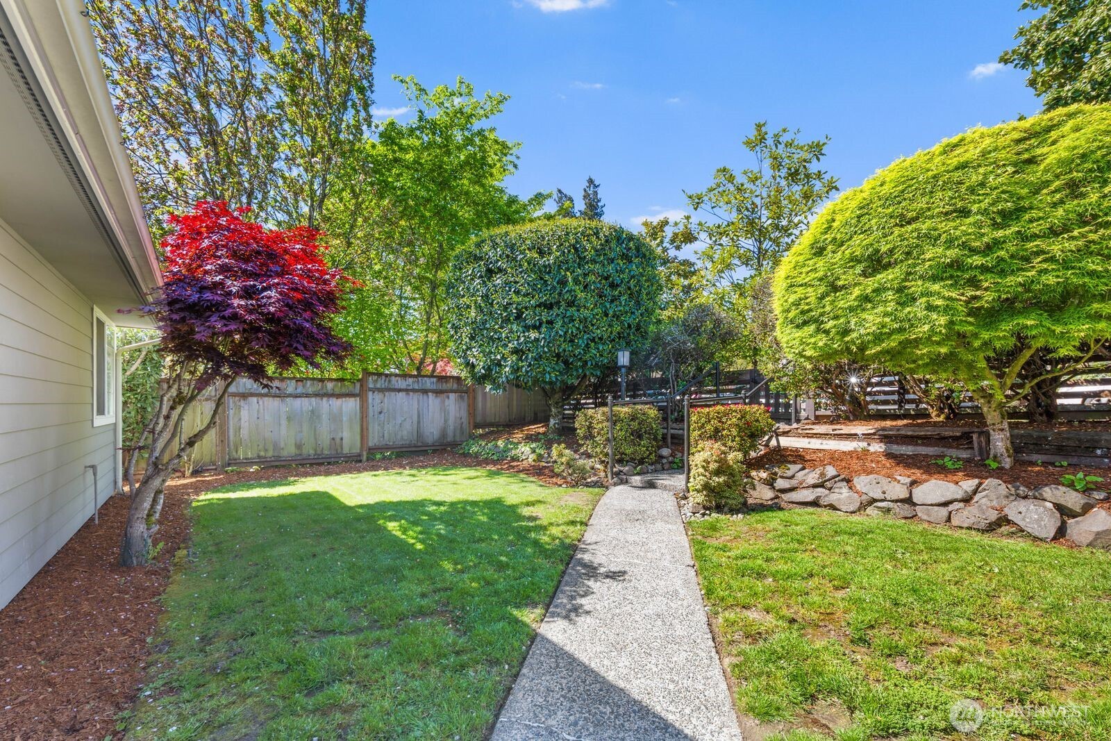 7508 30th Avenue Southwest Seattle, WA 98126 - Photo 38 of 39 a view of a backyard with sitting area