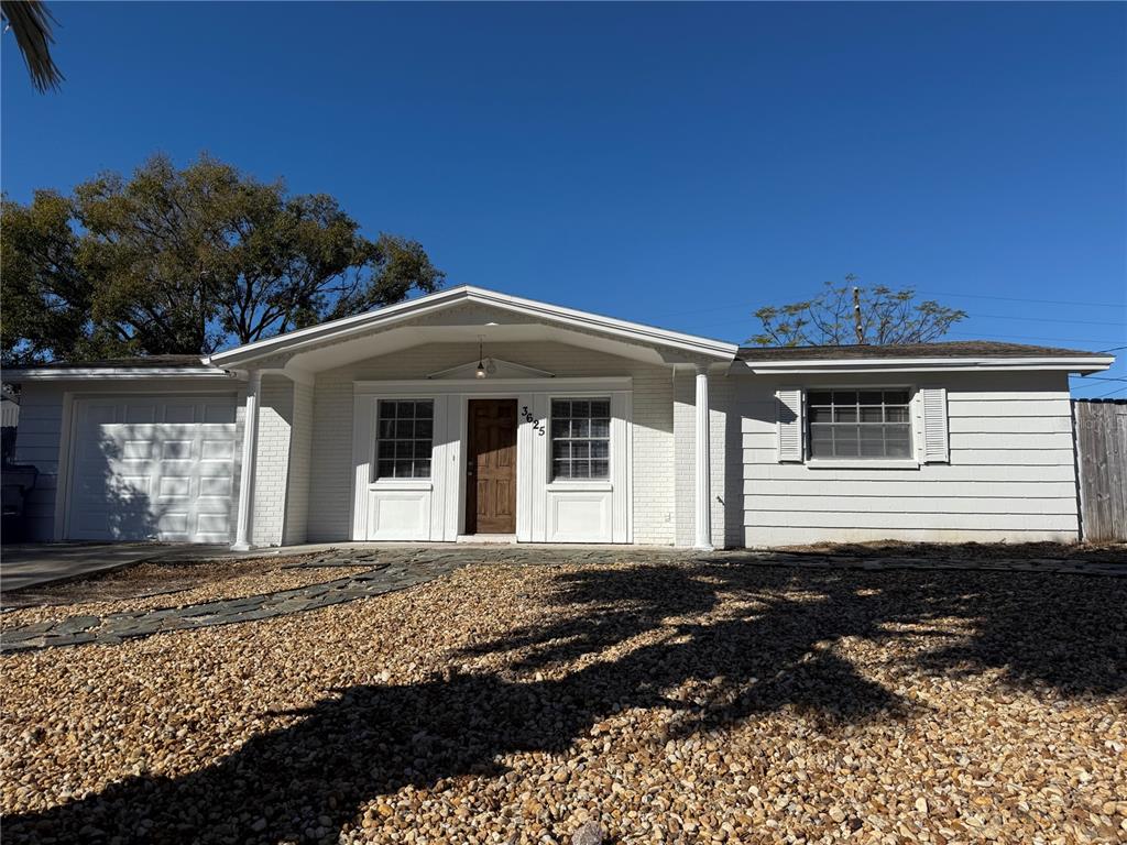 3625 Windham Drive Holiday, FL 34691 - Photo 1 of 28 a front view of a house with a yard