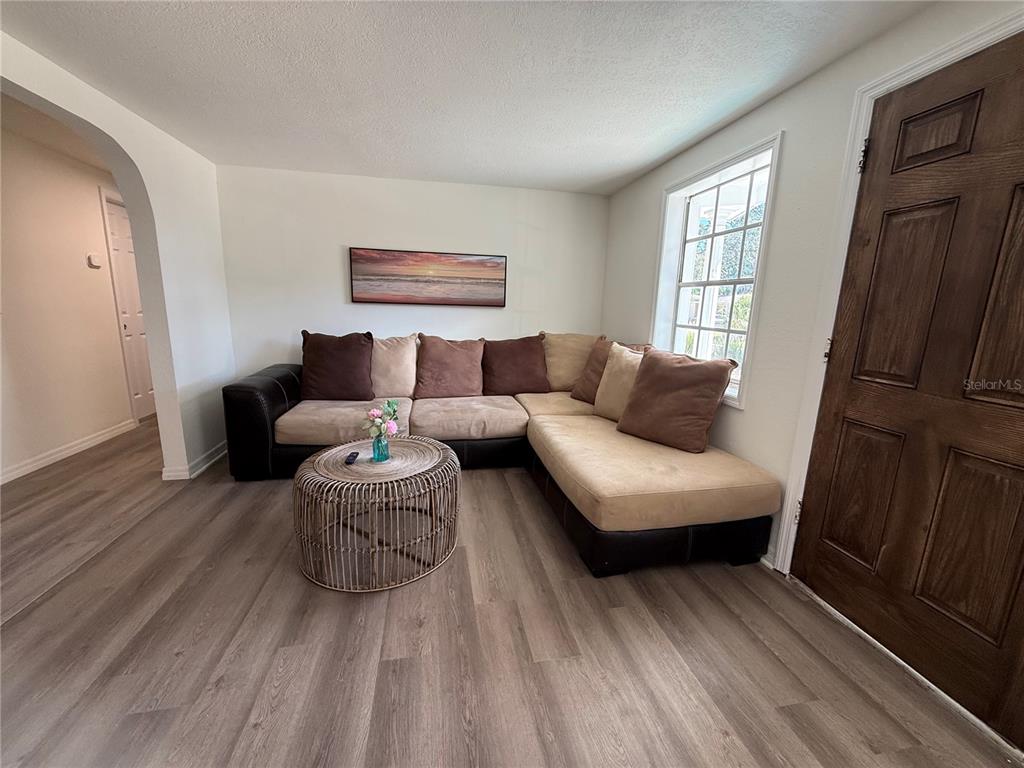 3625 Windham Drive Holiday, FL 34691 - Photo 11 of 28 a living room with furniture and a window