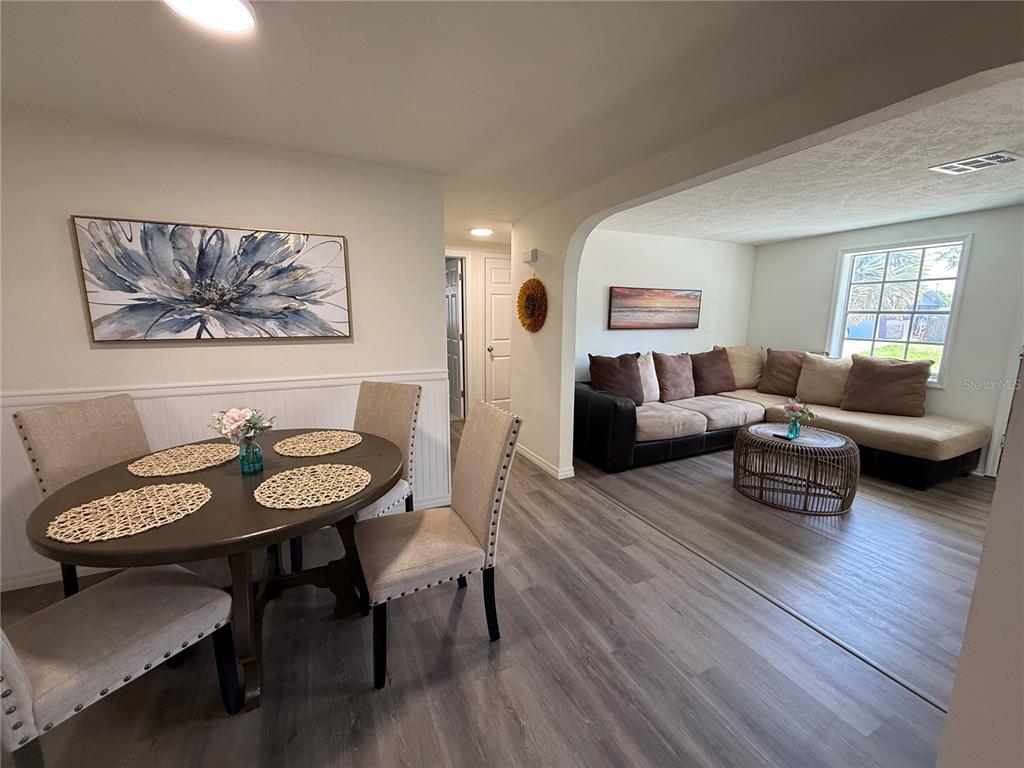 3625 Windham Drive Holiday, FL 34691 - Photo 16 of 28 a living room with furniture and a wooden floor