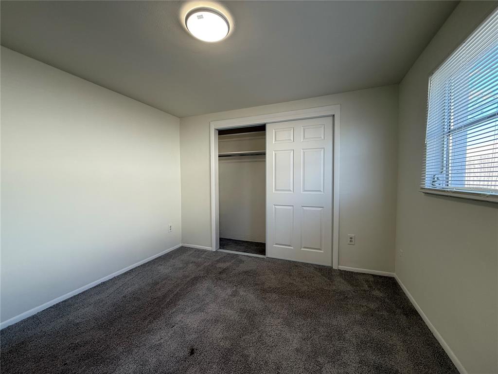 3625 Windham Drive Holiday, FL 34691 - Photo 22 of 28 an empty room with windows